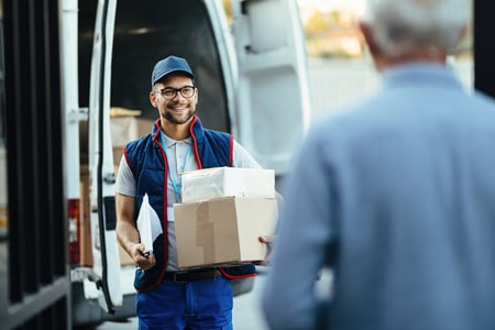 Delivery person delivering packages